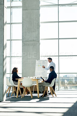 Buy stock photo Meeting, whiteboard and business man with team in office for strategy, finance review and planning. Corporate, space and workers in presentation for financial growth, feedback and proposal ideas