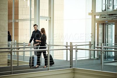 Buy stock photo Walking, travel and luggage with business people in hotel for conference, booking accommodation and seminar. Convention arrival, suitcase and reservation with employees for hospitality and trip