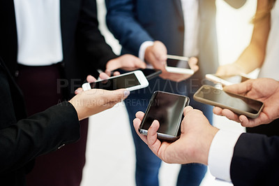 Buy stock photo Cellphone, hands and business people in circle in office for connectivity, networking or communication. Technology, team and group of lawyers with phone for email with collaboration in workplace.