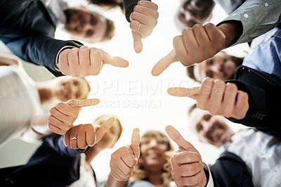 Buy stock photo Low angle, agreement or business people with thumbs up in office for good job, well done or teamwork. Group, okay or hands of employees with like feedback or yes sign for review or staff development