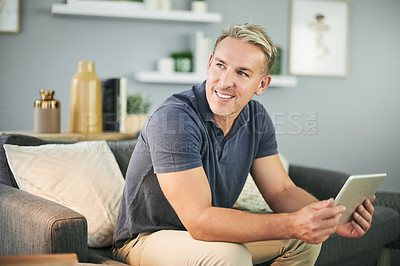 Buy stock photo Happy, freelancer and man with tablet, home or plan for article to publish, thinking and journalist. Online, reporter and mature person with tech for story, reflection and smile for remote work