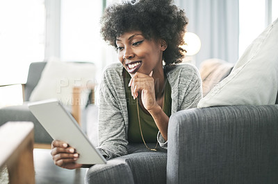 Buy stock photo Tablet, reading and smile with black woman on sofa for social media, connection and communication. Relax, online app and streaming with person in living room of home for digital post and ebook