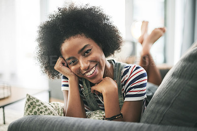 Buy stock photo Black woman, happy and portrait on couch in house with off day, weekend or rest in living room. Smile, female person and relax on sofa for break in lounge, stress relief or comfortable in apartment