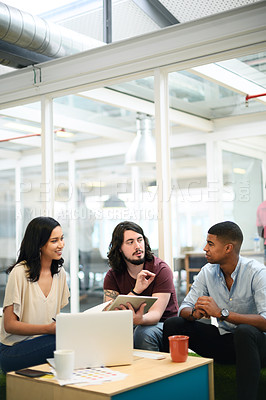 Buy stock photo Discussion, business people and tablet with laptop in office, planning and online search for startup. Teamwork, employees and digital with tech for information, talking or prepare for presentation