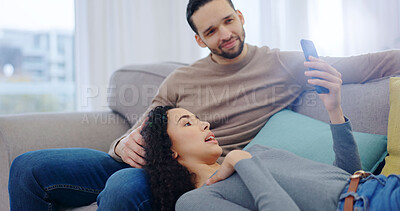 Buy stock photo Happy, relax and couple on sofa with phone, social media and option for online shopping on weekend. Home, marriage and man with woman on cellphone, website and internet for bonding, love and talking