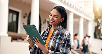 Buy stock photo Woman, student and smile at campus with tablet, test results and acceptance email for new semester. Happy, female person and tech at university for enrollment, scholarship update and exchange program