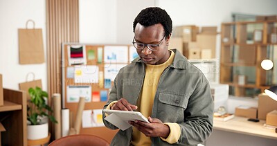 Buy stock photo Small business, search and black man in office with tablet for erp technology at ecommerce startup. Export, web or entrepreneur on digital app for online sales data, checklist or inventory management