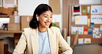 Laptop, office and business woman for supply chain, logistics and video call for meeting. Startup, workshop and person with earphones, virtual chat and tech for shipping, delivery and supplier update