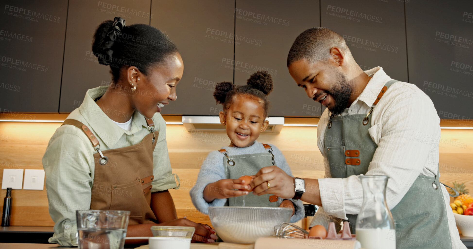 Buy stock photo Baking, kitchen and child with parents, eggs and bowl for meal prep, recipe and learning together. Home, family and black girl with mom, dad and help for ingredients, cooking and bonding for growth