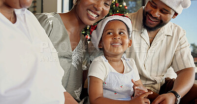 Buy stock photo Grandma, parents and child on sofa at Christmas for bonding, family visit and moment in holiday. Happy, home and African girl with mom, dad and grandmother for love, festive tradition and celebration