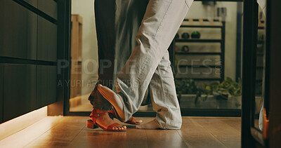Buy stock photo Love, couple or legs in house with dance, playful moment or bonding together on weekend break. Movement, groove or people in home with romance, rhythm or fun connection in healthy relationship.
