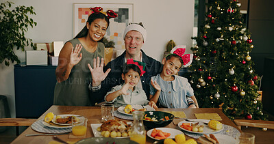 Buy stock photo Christmas, video call and family with dinner, home and waving together on festive season or bonding. Happy people, portrait and parents with kids on Xmas, interracial and greeting for virtual chat