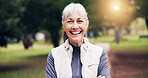 Portrait, old woman and smile in nature for fitness, confidence and exercise for healthy lifestyle. Happy, senior person and laugh at park with arms crossed, training and morning routine for wellness
