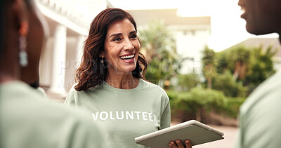 Buy stock photo Happy, woman and team with tablet for volunteering, sign up and appoint task of community outreach. Smile, coordinator or people with digital for charity, participation and job allocation for welfare