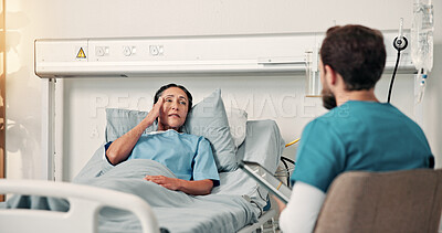 Buy stock photo Nurse, checkup and woman in hospital bed with headache, symptoms and negative reaction to treatment. Healthcare worker, mature person and discussion in clinic with migraine, slow recovery and pain.