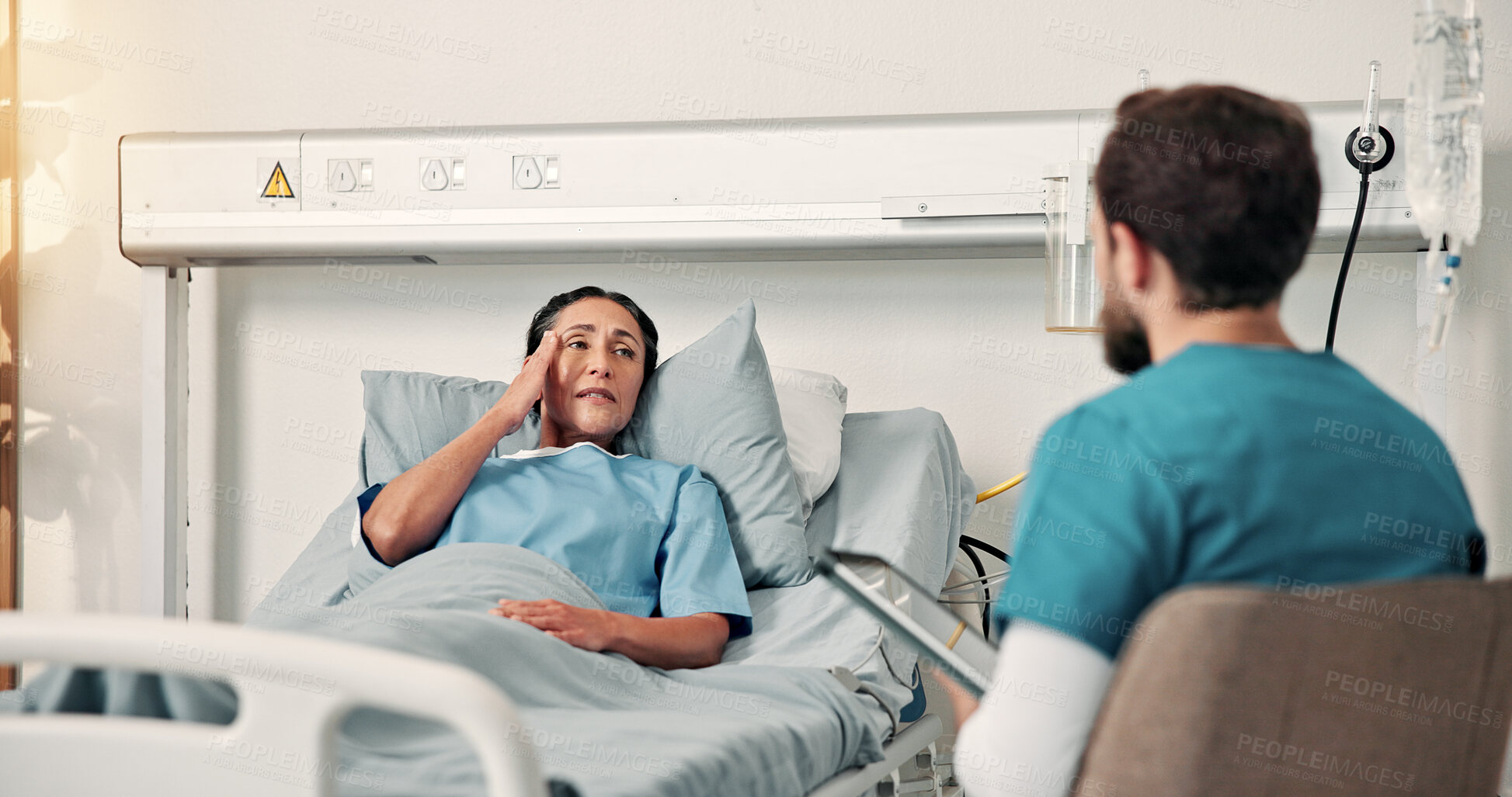 Buy stock photo Nurse, checkup and woman in hospital bed with headache, symptoms and negative reaction to treatment. Healthcare worker, mature person and discussion in clinic with migraine, slow recovery and pain.
