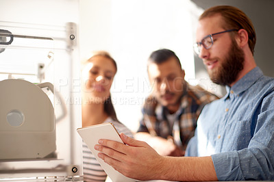 Buy stock photo Business people, 3D printer and man with tablet, planning and creativity for project. Group, employees and designers in studio, brainstorming or tech for ideas, teamwork and internet with digital app