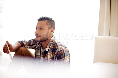 Buy stock photo Relax, tablet and smile with man on sofa for streaming service, internet movie and multimedia app. Subscription sign up, connection and social media with person in living room at home for online