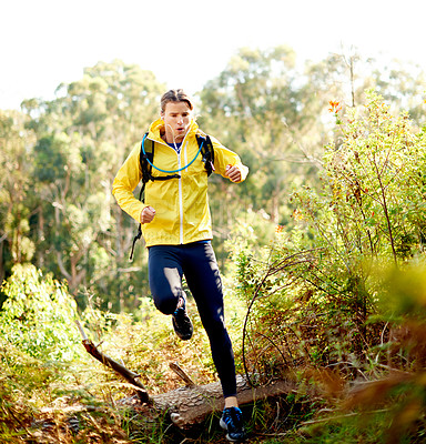 Buy stock photo Nature, running and man on mountain for hiking with fitness, exercise or training on trail. Sports, outdoor and male person trekking for cardio workout with health, activity or hobby with backpack.