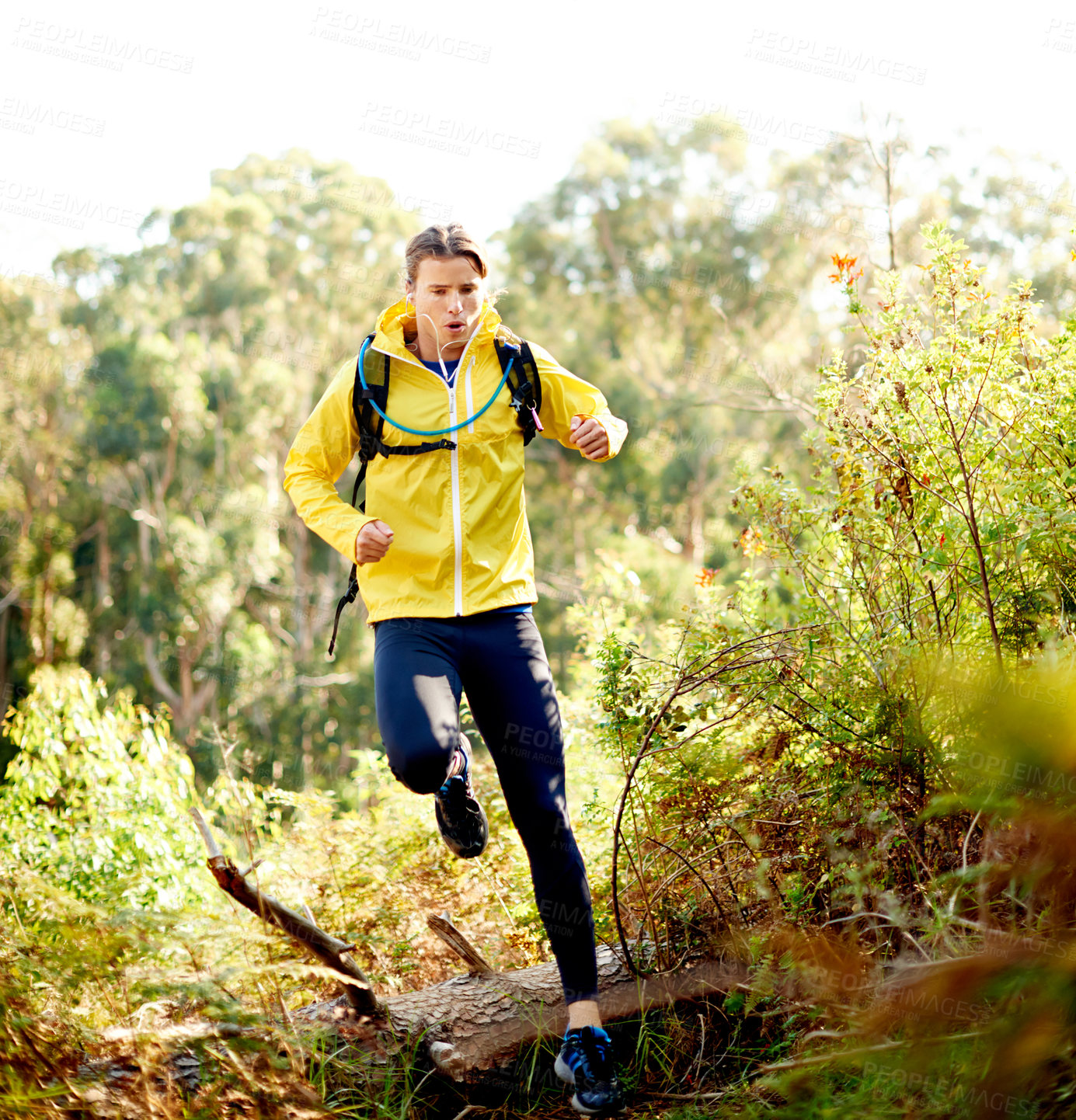 Buy stock photo Nature, running and man on mountain for hiking with fitness, exercise or training on trail. Sports, outdoor and male person trekking for cardio workout with health, activity or hobby with backpack.