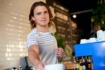 Buy stock photo Man, barista and giving cup at cafe, portrait and happy with customer pov at restaurant for drink. Person, waiter and confidence for service with latte, cappuccino or tea at coffee shop in Italy