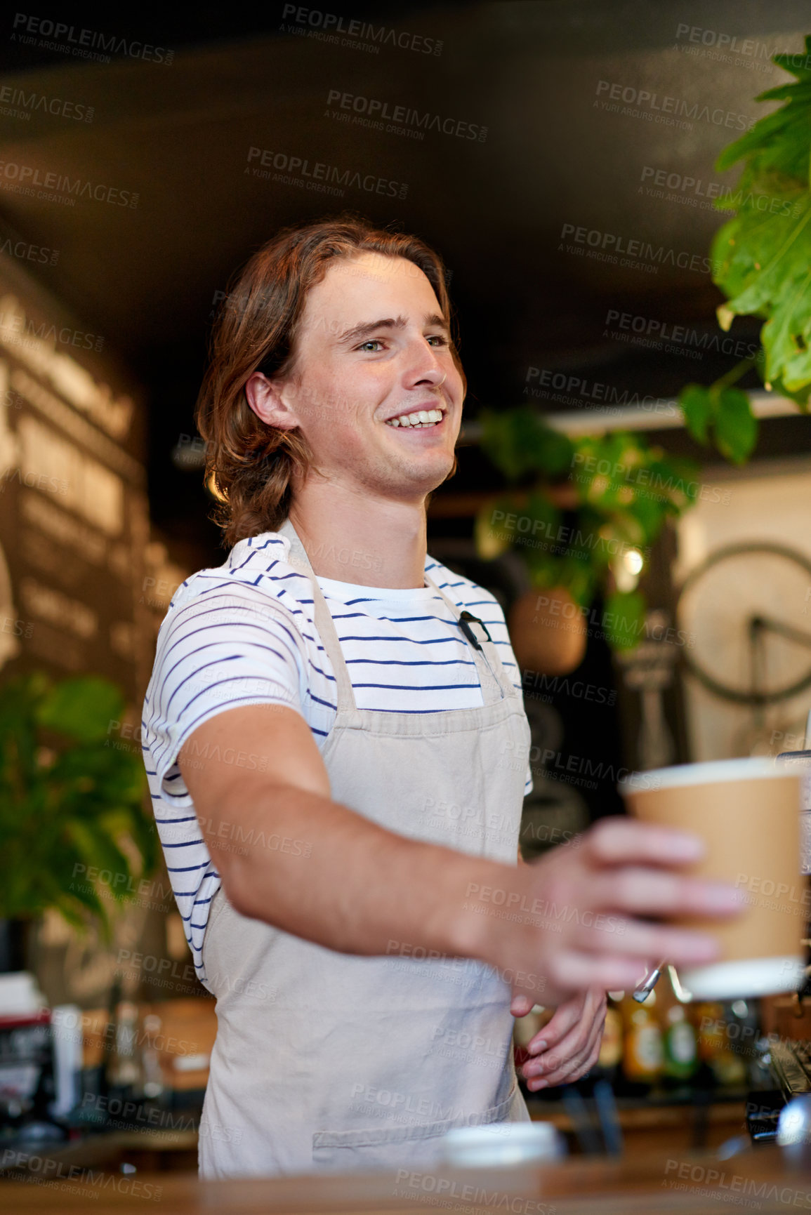 Buy stock photo Happy man, barista and giving coffee at cafe, beverage and sale with deal for restaurant customer. Person, waiter and server with drink order, low angle or smile for catering with tea cup at diner