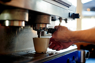 Buy stock photo Hands, barista and cup at machine in cafe for brewing coffee, order preparation or hospitality. Restaurant, service and person with process for premium blend cappuccino, latte drink or fresh caffeine