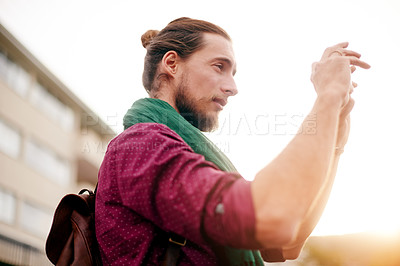 Buy stock photo Creative, man or tourist in city for photography, travel adventure or sightseeing on trip. Outdoor, capture or male person taking picture in urban town for memory, destination or location in London