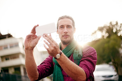 Buy stock photo Picture, man or tourist in city for view, travel adventure and sightseeing to explore town. Outdoor, post or person taking photograph in street for memory, social media or location in London, England