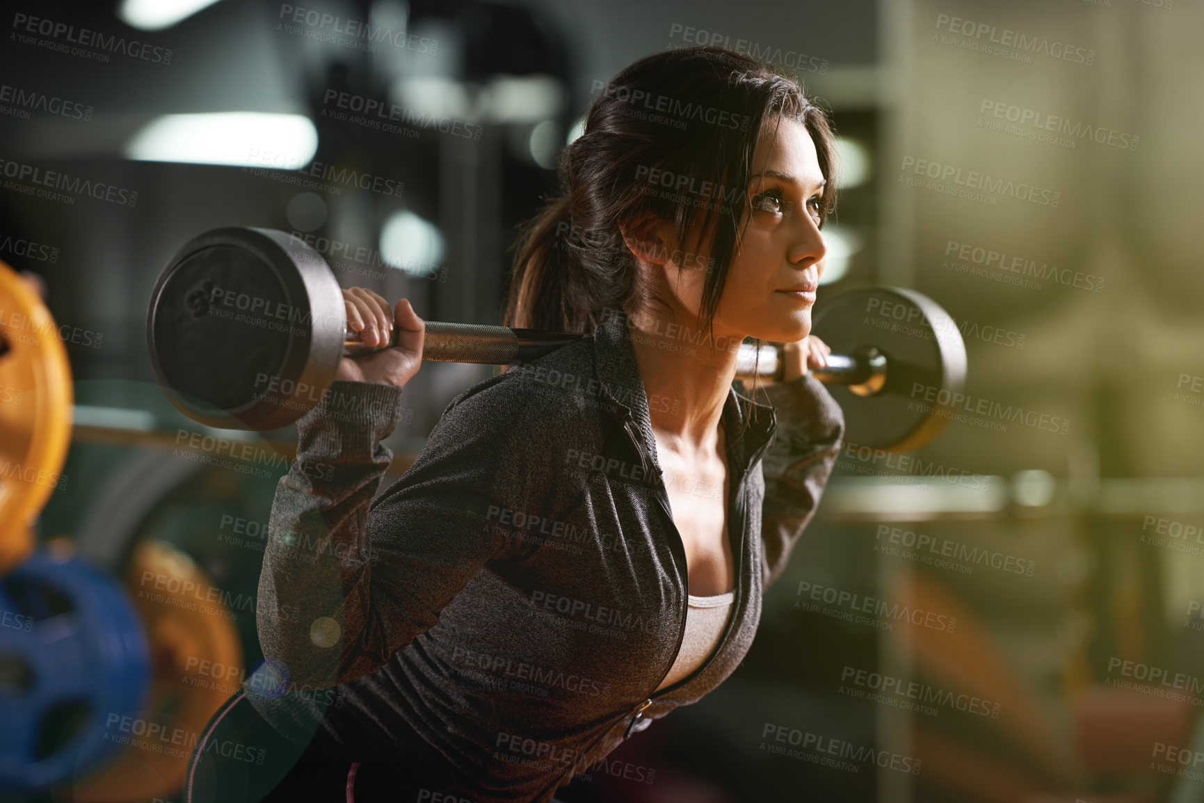 Buy stock photo Weightlifting, barbell and training with woman in gym for back squat, fitness and workout. Bodybuilder, muscle challenge and exercise with person and weights in club for wellness and strong athlete