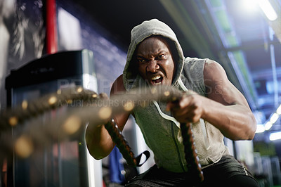 Buy stock photo Black man, fitness and battle ropes at gym for muscle, development and power with workout for growth. Intense, training and person with strong arms, exercise and endurance for progress at health club