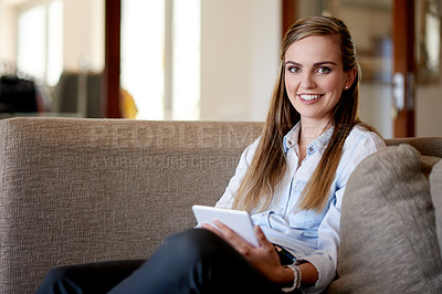 Buy stock photo Woman, tablet and relax on sofa, portrait or scroll for ebook, smile or film streaming at home. Person, happy and tech in lounge with application, subscription and social media at house in Spain