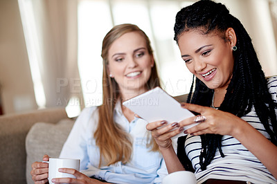 Buy stock photo Smile, woman and friends on tablet at house for social media, streaming movies and funny video. People, laughing and coffee with digital for surfing internet, browsing film and comedy show at reunion