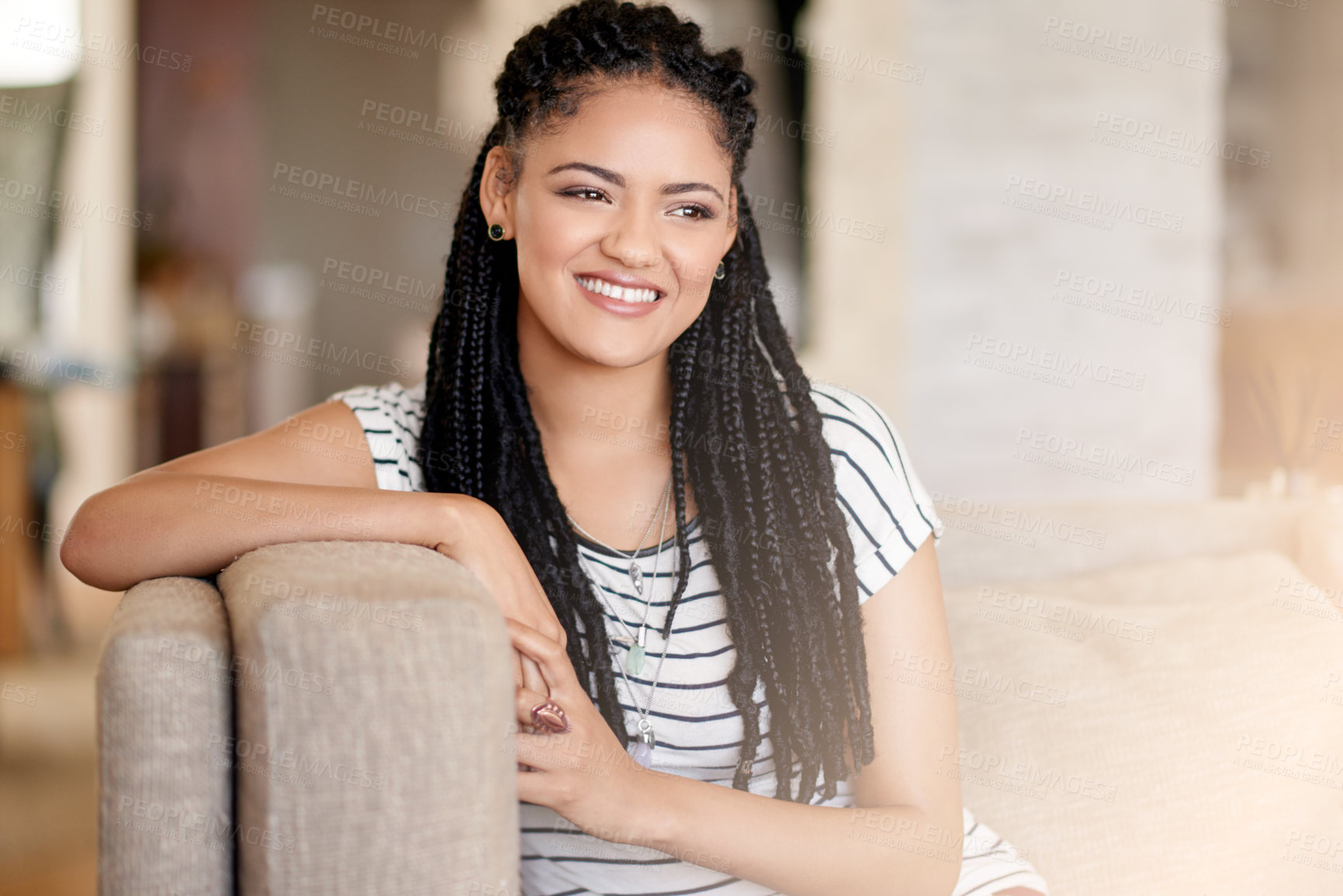 Buy stock photo Thinking, student and smile with woman on sofa for peace, reflection and me time. College break, happiness and vision with female person in living room of home for weekend, perspective and confidence