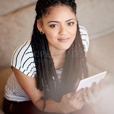 Buy stock photo Home, woman and portrait with tablet for relax, communication or online app above. Happy African person, living room and digital technology for social media, internet and chill on weekend in Ghana