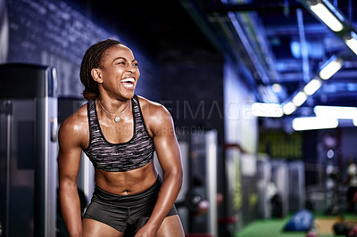 Buy stock photo Bodybuilding, fitness and laughing with black woman in gym for challenge or performance success. Exercise, funny and wellness with muscular athlete in health club for training or workout milestone