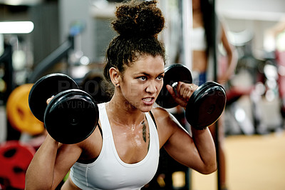 Buy stock photo Fitness, woman and dumbbell for weightlifting, workout and exercise in gym for health and power. African person, bodybuilder and commitment for muscle development, challenge or training for wellness