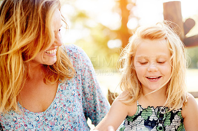 Buy stock photo Smile, mother and child talk outdoor, bonding and funny joke with story on holiday together. Mom, happy girl and conversation in nature for care, love and laughing on family vacation with parent