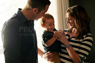Buy stock photo Happy family, toddler or playing with snow globe for sensory or early childhood development in home. Mom, dad and boy child with smile or toy for fun learning, game or bonding together in nursery