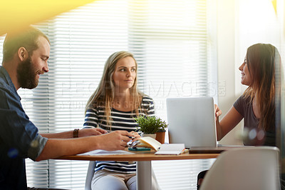 Buy stock photo Conversation, meeting and planning with designer people in office together for brainstorming. Collaboration, flare and laptop with employee team in creative workplace for business, design or strategy