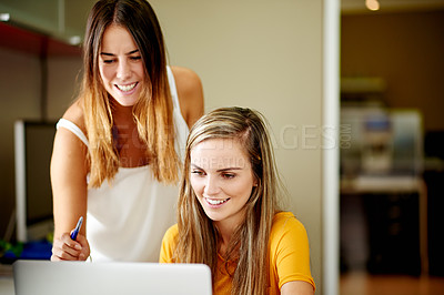 Buy stock photo Collaboration, laptop and reading with business women in office together for planning or research. Computer, information and smile of employee team in workplace for administration or online report