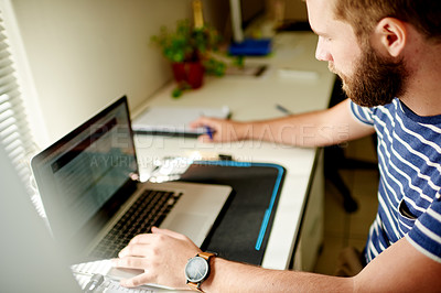 Buy stock photo Finance, laptop and planning with man in home office for accounting, budget or review of investment. Computer, financial invoice and typing with person at desk in apartment for bill or statement