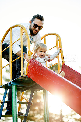 Buy stock photo Dad, girl and park with slide, baby and play outdoor in summer with care, love and support. Father, toddler and helping hand on steps in nature, guide or bonding with family for games in New Zealand