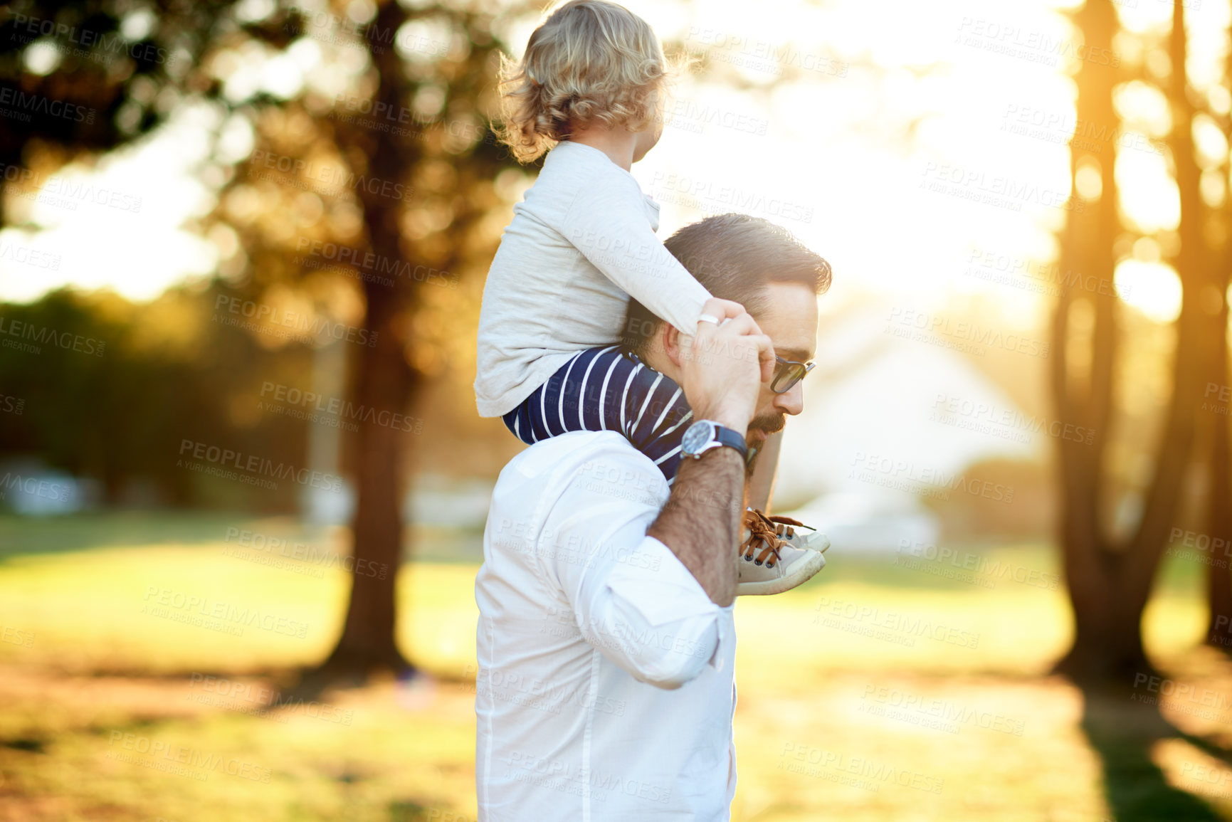 Buy stock photo Family, father and child on shoulder at park for travel, playful fun and bonding together on holiday. Man, walk and carry toddler with love, balance support and vacation with games to explore nature