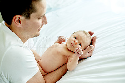 Buy stock photo Bonding, sweet and dad holding baby in home for love, family time and cute moment together. Connection, child and father with newborn kid for care, support or affection in parenthood at house.