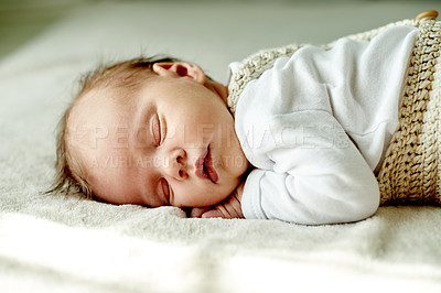 Buy stock photo Relax, home and sleep with baby on bed, comfort and dreaming with afternoon nap. Apartment, child development and kid with rest, calm and cozy with adorable newborn, growth and infant in bedroom