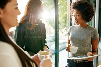 Buy stock photo Business women, tablet and idea in meeting for review, coffee or news report. Technology, group and discussion with journalist in office for feedback, creative update or brainstorming with story lead