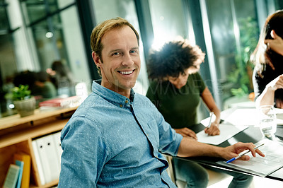 Buy stock photo Happy, business or man in office with team, meeting or confident for night collaboration. Smile, employee or people in board room with portrait, strategy or overtime planning for company project.