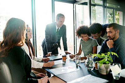 Buy stock photo Presentation, documents and manager with business people in office for finance, feedback and strategy. Professional, corporate and man with workers for financial report, discussion and proposal
