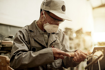 Buy stock photo Carpenter, man or safety glasses in woodwork with equipment, focus and construction in warehouse. Serious, artisan or person with tools, manual labour or repair in workshop for small business